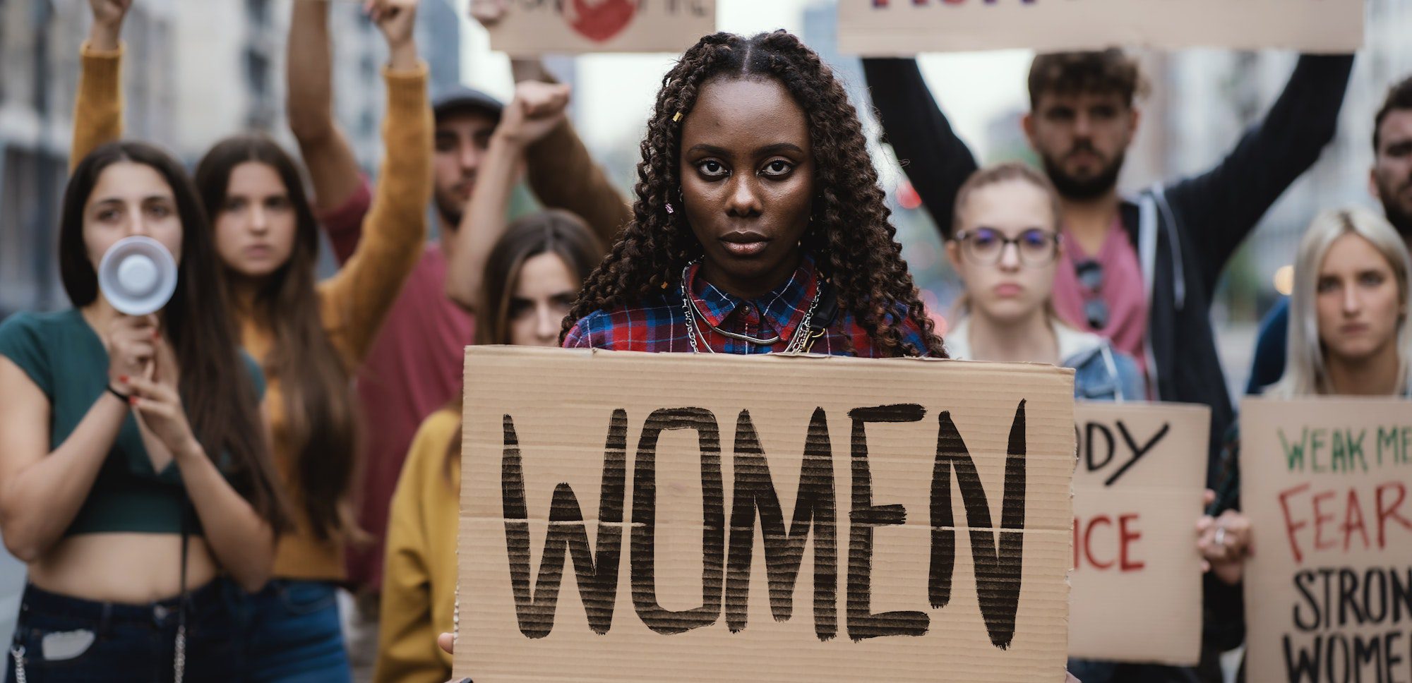 protesters marching for women rights